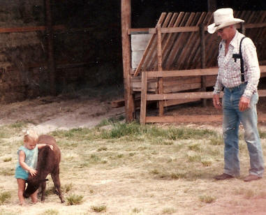 Chuck and granddaughter Torrie with miniature horse foal in 1979